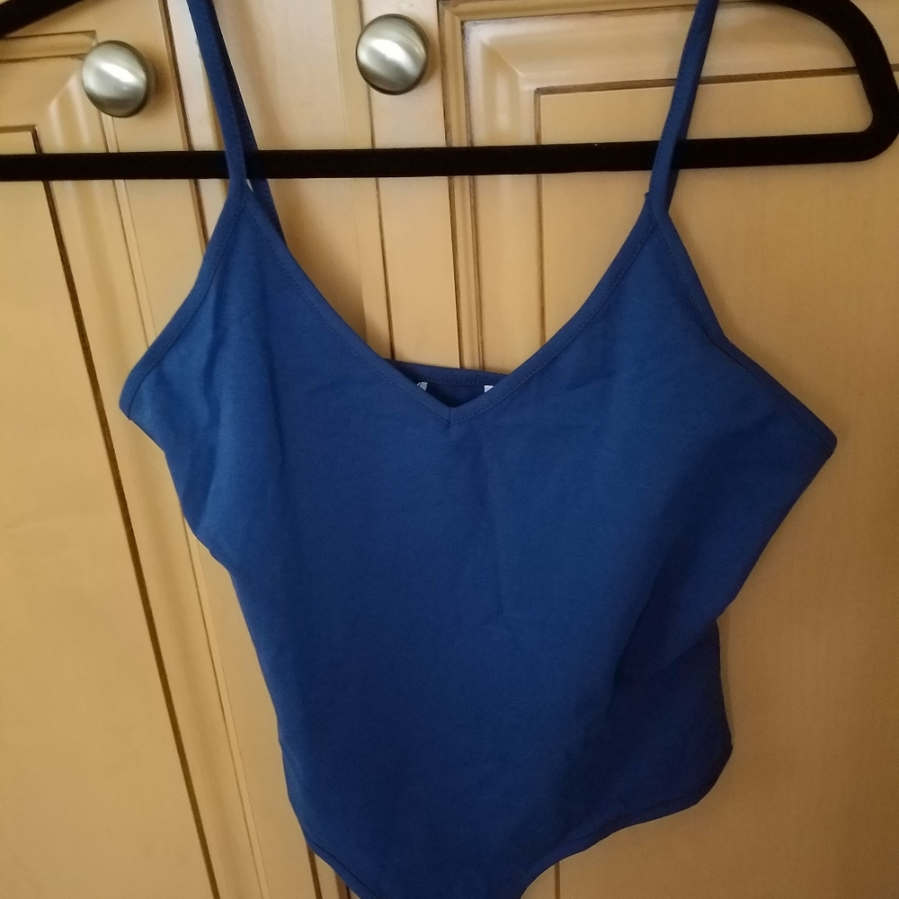 Linmon Women's Sleeveless Bodysuit With Snap Enclosure On Bottom.